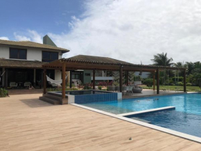 Casa com 950m2 - Condomínio Enseadinha